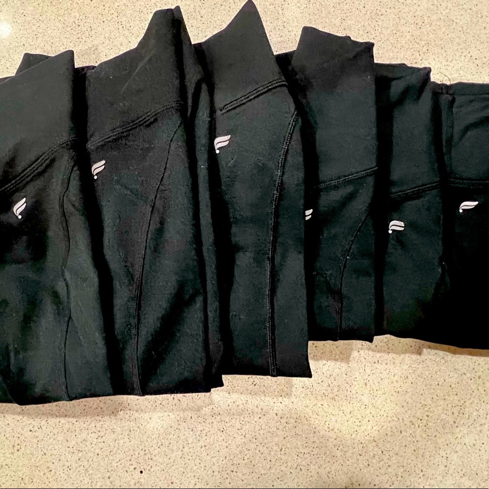6 Pair Fabletics Powerhold Medium High Waisted Leggings.